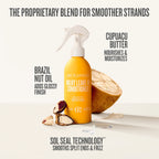 Orange conditioner bottle with coconut and text on a white background