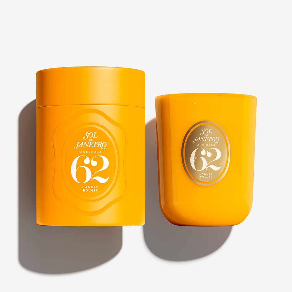 Two bright yellow-orange candles from Sol Janeiro Círculo 62 shown on a clean white background, one in a cylindrical tin and one in a rounded glass vessel, both with matching circular labels.