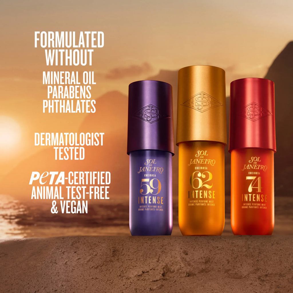 Three Sol Janiero Original Intense sunscreen bottles (59, 62, and 77) in purple, gold, and red packaging, standing on a sandy beach with sunset mountains in the background. White text on the left highlights key product features.