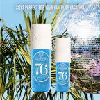 Two Sol de Janeiro bottles with a disco ball and palm leaves in the background