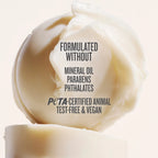 Bar of soap with text indicating it is PETA-certified, animal test-free, and vegan.